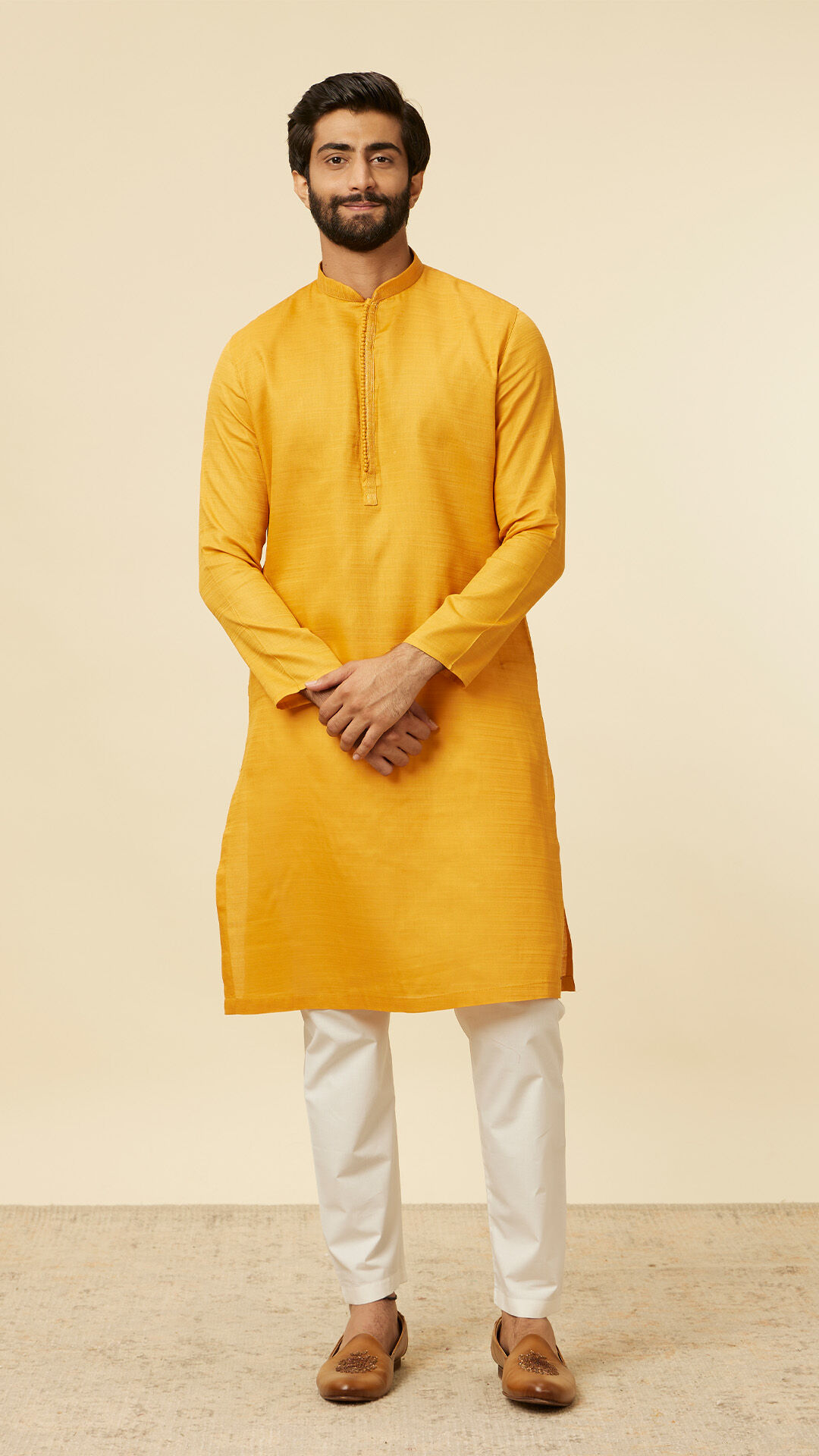 Man wearing beautiful mustard yellow kurta